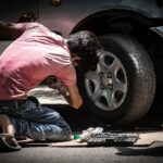 membongkar mobil